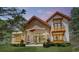 Beautiful home featuring a covered patio, balcony, stone accents and manicured lawn at 11790 Huckleberry Dr, Franktown, CO 80116