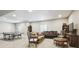 Finished basement area with neutral walls, a sofa, and entertainment area at 17056 E 111Th Ave, Commerce City, CO 80022