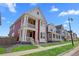 Street view of modern homes with well-manicured lawns and sidewalks at 213 Washington St, Erie, CO 80516