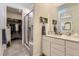 Bathroom with shower and walk-in closet at 15919 Xanthia Way, Thornton, CO 80602