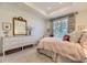 Bright bedroom features soft carpet, and stylish curtains at 15919 Xanthia Way, Thornton, CO 80602