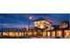 Stunning clubhouse with inviting entrance, stone pillars, and elegant architectural details at 15919 Xanthia Way, Thornton, CO 80602