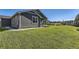 Well-maintained home with green lawn, mature trees, and nice landscaping at 15919 Xanthia Way, Thornton, CO 80602