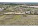 Large rural property with fields, barns, and a house, offering potential for various uses at 50950 E 32Nd Ave, Bennett, CO 80102