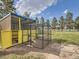 Chicken coop and run in backyard at 50950 E 32Nd Ave, Bennett, CO 80102