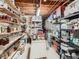 Basement pantry filled with canned goods and supplies at 50950 E 32Nd Ave, Bennett, CO 80102