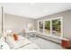 Bedroom with a large window and an adjacent work area at 7743 S Birch Ct, Centennial, CO 80122