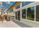 Exterior view of home featuring a patio with black metal rails and sliding glass doors at 7743 S Birch Ct, Centennial, CO 80122