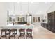 Spacious kitchen with a center island, stainless steel appliances, and ample counter space at 7743 S Birch Ct, Centennial, CO 80122