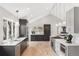 Contemporary kitchen boasting quartz countertops, stainless steel appliances, and sleek cabinetry at 7743 S Birch Ct, Centennial, CO 80122