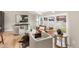Comfortable living room featuring large windows and stylish decor at 7743 S Birch Ct, Centennial, CO 80122