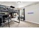 A cozy bedroom with a loft bed, desk, and playful decorations, great for or teens at 26903 E Easter Pl, Aurora, CO 80016