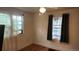 Simple bedroom with neutral walls and a window, creating a cozy and personal space at 1653 Trenton St, Denver, CO 80220