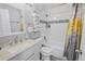Well-lit bathroom with white subway tile shower, and modern vanity and fixtures at 18971 E Mercer Dr, Aurora, CO 80013