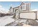 Charming two-story home with attached garage, well-maintained lawn, and inviting curb appeal at 18971 E Mercer Dr, Aurora, CO 80013