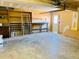 Attached garage with ample storage shelving and workbench at 18971 E Mercer Dr, Aurora, CO 80013