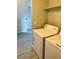 Laundry area with a washer and dryer, and a view to another room at 18971 E Mercer Dr, Aurora, CO 80013