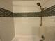 Clean and modern bathroom with subway tile and updated fixtures at 865 S Depew St, Lakewood, CO 80226