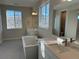 A modern bathroom featuring double sinks, a soaking tub and updated fixtures at 3350 Backdrop Ct, Castle Rock, CO 80108