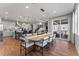 Bright dining room with an open concept and sliding glass doors to the outdoor patio at 3350 Backdrop Ct, Castle Rock, CO 80108