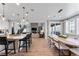 Bright dining room is adjacent to the kitchen and overlooks the spacious living room at 3350 Backdrop Ct, Castle Rock, CO 80108