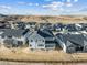 View of a bright and inviting two-story home with white and gray siding at 3350 Backdrop Ct, Castle Rock, CO 80108