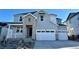 Beautiful two-story home with attached two-car garage and light gray siding at 3350 Backdrop Ct, Castle Rock, CO 80108