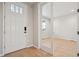 Inviting foyer with wood floors and ample light at 3350 Backdrop Ct, Castle Rock, CO 80108