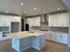 New kitchen with white cabinets, stainless steel appliances, and marble countertops at 3350 Backdrop Ct, Castle Rock, CO 80108