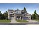 Charming two-story home with landscaped yard, two-car garage and covered porch at 1047 Morning Side Dr, Erie, CO 80516