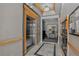 Hallway features elevator, mailboxes, and entryway at 303 Inverness Way # 201, Englewood, CO 80112
