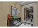 Hallway featuring decorative art and furnishings at 303 Inverness Way # 201, Englewood, CO 80112