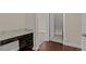The office features a built-in desk, hardwood floors, and easy access to closet space at 303 Inverness Way # 201, Englewood, CO 80112