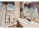 Bright bathroom with tiled countertops, and decorative accents, providing a functional and stylish space at 10968 Macon St, Commerce City, CO 80640