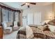 Relaxing bedroom with neutral colors, a large closet, and comfortable seating creating a serene retreat at 10968 Macon St, Commerce City, CO 80640