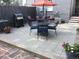 Backyard patio featuring an outdoor dining area with an umbrella, perfect for summer gatherings at 1038 E 4Th Ave, Denver, CO 80218