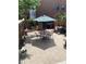 Backyard patio with an outdoor dining area, privacy fence, and space for entertaining at 1038 E 4Th Ave, Denver, CO 80218