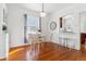 Inviting dining room with hardwood floors and views into the adjoining kitchen at 1038 E 4Th Ave, Denver, CO 80218