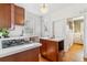 Kitchen featuring a gas range and island with a white countertop at 1038 E 4Th Ave, Denver, CO 80218