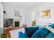 Inviting living room features a decorative fireplace and comfortable seating arrangement at 1038 E 4Th Ave, Denver, CO 80218