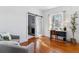 Bright living room features a fireplace and office area with an entrance at 1038 E 4Th Ave, Denver, CO 80218
