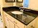 Bathroom vanity with granite countertop at 3124 S Wheeling Way # 102, Aurora, CO 80014