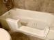 Bathroom featuring a walk-in tub at 3124 S Wheeling Way # 102, Aurora, CO 80014