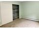Bedroom with closet with sliding doors at 3124 S Wheeling Way # 102, Aurora, CO 80014