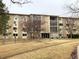 Apartment exterior showcasing well-maintained landscaping and common areas at 3124 S Wheeling Way # 102, Aurora, CO 80014