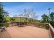 A spacious wooden deck with patio furniture, perfect for outdoor entertaining at 25808 Sunrise Ln, Golden, CO 80401