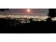 Night view of city lights at 25808 Sunrise Ln, Golden, CO 80401