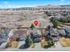 Aerial view of a home in a neighborhood, backing to open land, with mountain views at 6725 Lionshead Pkwy, Lone Tree, CO 80124