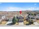 Charming home with well-manicured lawn located across from open land and mountain views at 6725 Lionshead Pkwy, Lone Tree, CO 80124