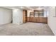 Finished basement with built-in shelving at 6712 E Briarwood Dr, Centennial, CO 80112